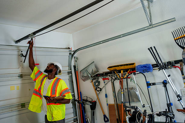 Professional Garage Door Installation technician working in Rogersville, TN